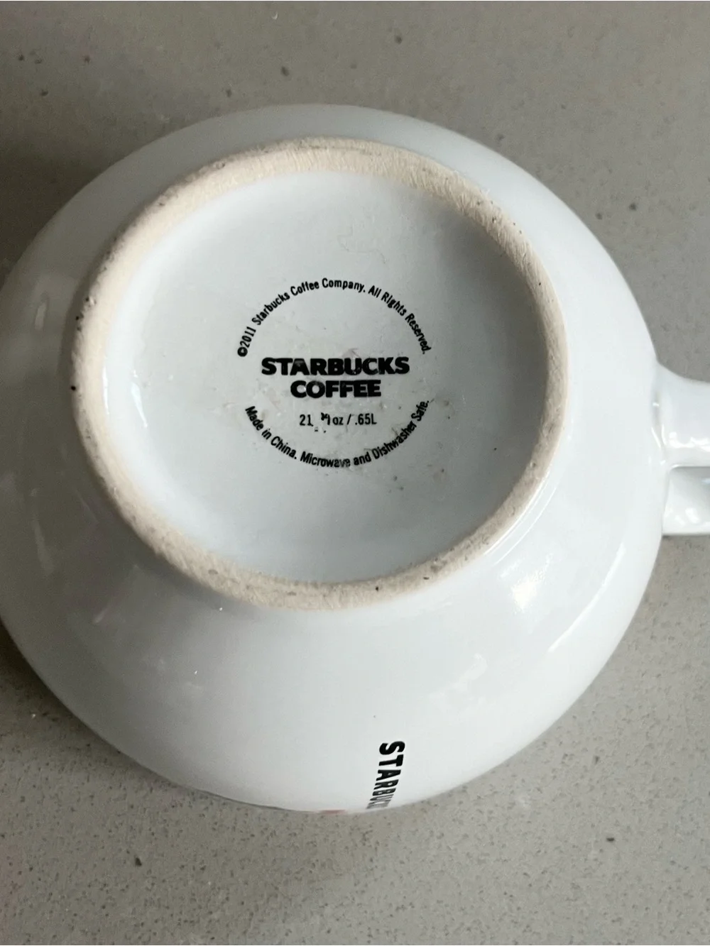 Starbucks holiday mug is in excellent condition. White oversized mug reads STARB